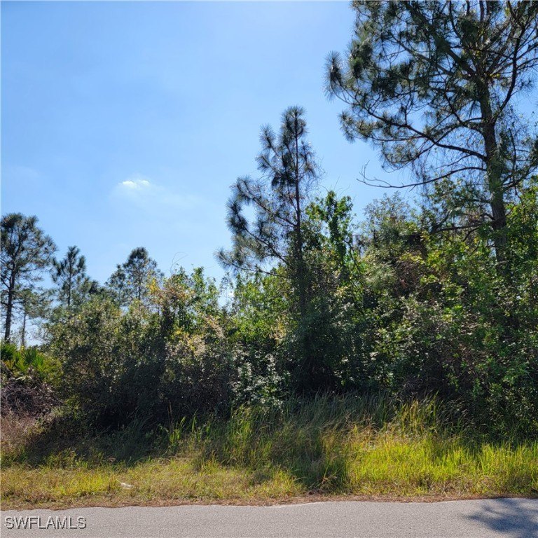 Nice oversized waterfront/canal vacant lot with .28 Acres, 83ft - Beach Lot for sale in Lehigh Acres, Florida on Beachhouse.com