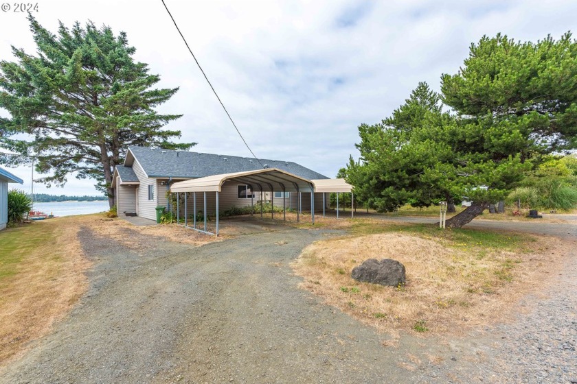 **Bayfront Duplex Investment Opportunity!**Discover the perfect - Beach Lot for sale in Coos Bay, Oregon on Beachhouse.com