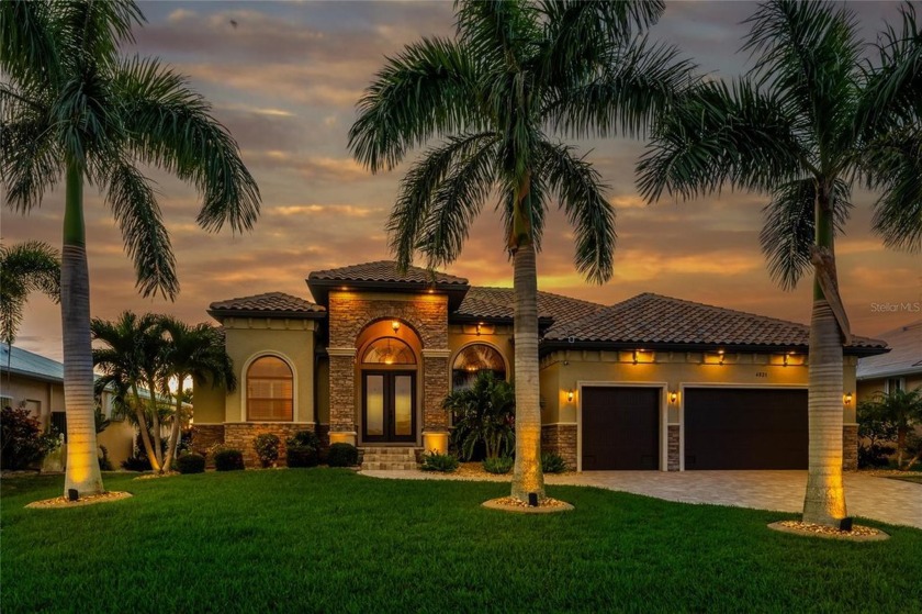 Curb appeal abounds from this striking residence with impressive - Beach Home for sale in Punta Gorda, Florida on Beachhouse.com