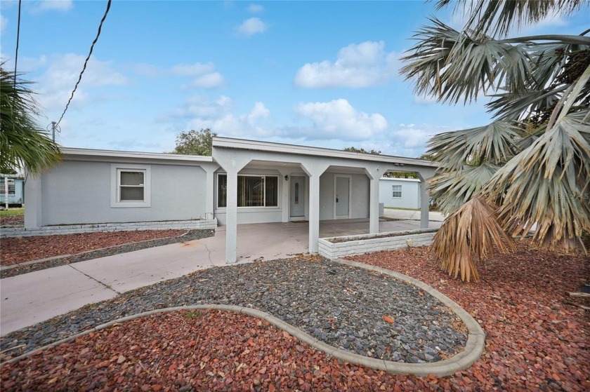 This beautifully updated, fully furnished canal-front pool home - Beach Home for sale in Port Charlotte, Florida on Beachhouse.com