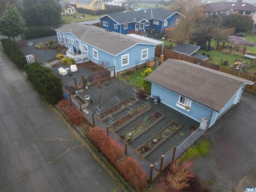 This beautifully maintained 3-bedroom, 2-bath home offers - Beach Home for sale in Port Angeles, Washington on Beachhouse.com