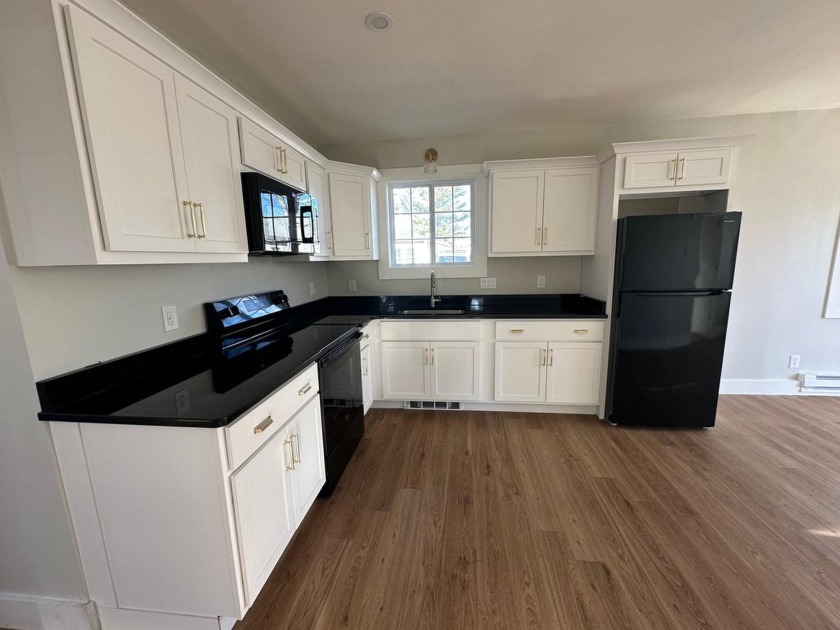 This beautifully renovated 3-bedroom, 1-bathroom home is - Beach Home for sale in Wareham, Massachusetts on Beachhouse.com