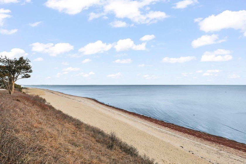 Breathe in the crisp sea air from this ocean-view cottage with - Beach Condo for sale in Mashpee, Massachusetts on Beachhouse.com