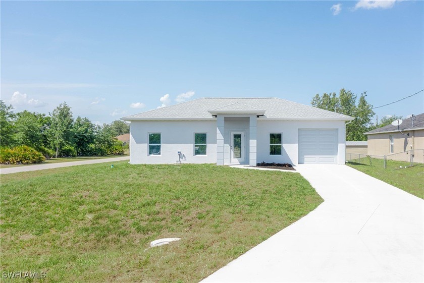 Nestled on a spacious corner lot in the vibrant community of - Beach Home for sale in Lehigh Acres, Florida on Beachhouse.com