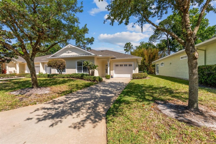 It feels like stepping into your own oasis. The spacious layout - Beach Home for sale in Palm Coast, Florida on Beachhouse.com
