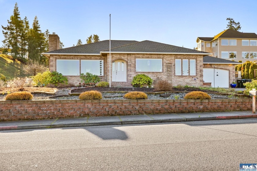 Enjoy beautiful views of the Strait from this spacious and - Beach Home for sale in Port Angeles, Washington on Beachhouse.com