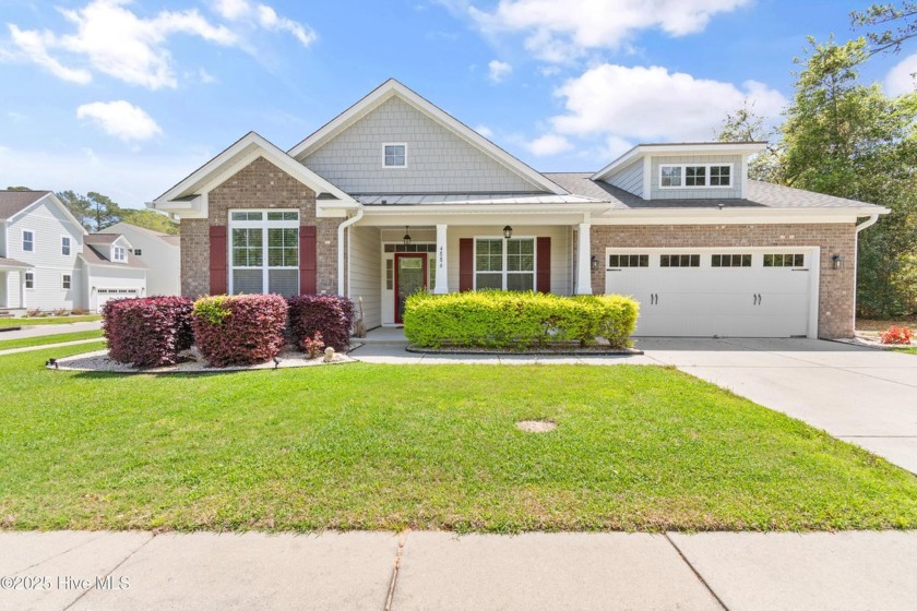 This beautifully maintained 3-bedroom, 2-baths home is nestled - Beach Home for sale in Shallotte, North Carolina on Beachhouse.com