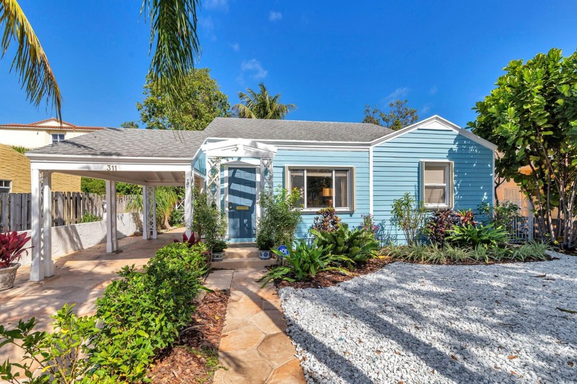 Island style at an amazing price in the south end! This Key West - Beach Home for sale in West Palm Beach, Florida on Beachhouse.com
