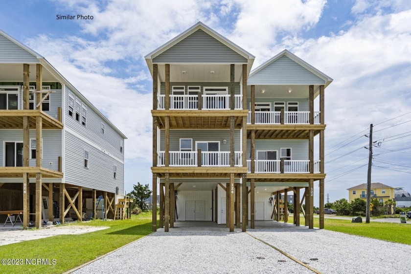 This stunning BRAND-NEW home on North Topsail Beach will fulfill - Beach Townhome/Townhouse for sale in North Topsail Beach, North Carolina on Beachhouse.com