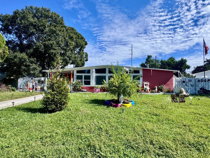 Welcome to this inviting mid-century ranch-style home bursting - Beach Home for sale in St. Petersburg, Florida on Beachhouse.com