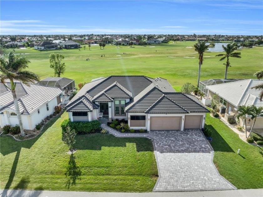 This exceptional residence, situated on the 13th hole of Twin - Beach Home for sale in Punta Gorda, Florida on Beachhouse.com