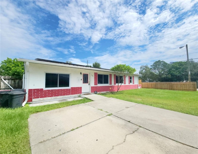 Welcome to this delightful 4 bedroom, 2 bathroom home, located - Beach Home for sale in Pinellas Park, Florida on Beachhouse.com