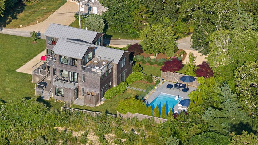 Water views with a pool! This chic contemporary 4-bedroom home - Beach Home for sale in Edgartown, Massachusetts on Beachhouse.com
