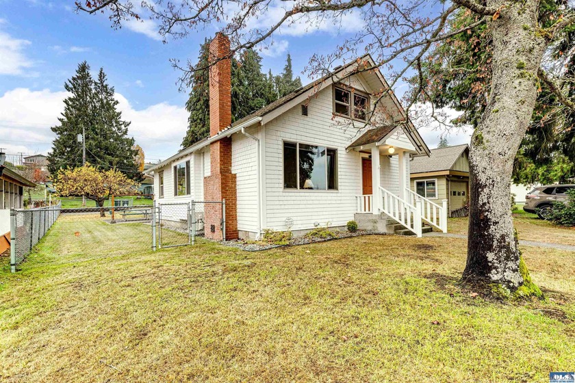 Step into timeless charm with this well-maintained 1920s 1 1/2 - Beach Home for sale in Port Angeles, Washington on Beachhouse.com
