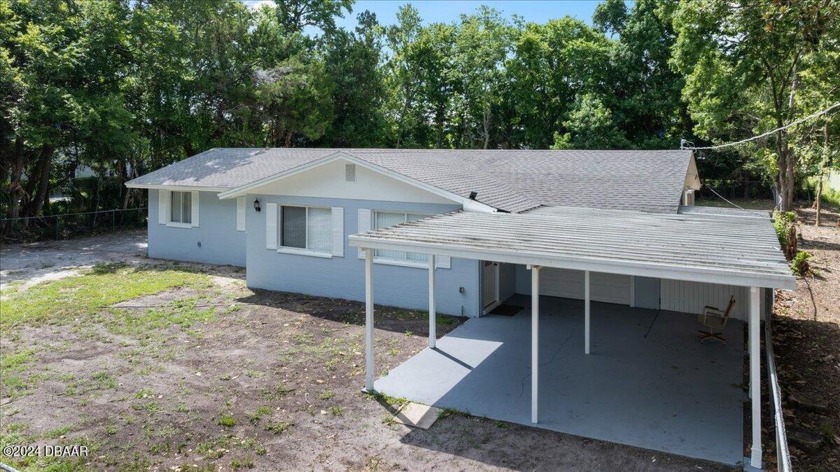 Welcome to this beautifully remodeled 3-bedroom, 2-bathroom home - Beach Home for sale in Daytona Beach, Florida on Beachhouse.com