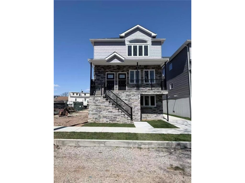 This exceptional new construction two-family home offers the - Beach Home for sale in Staten  Island, New York on Beachhouse.com
