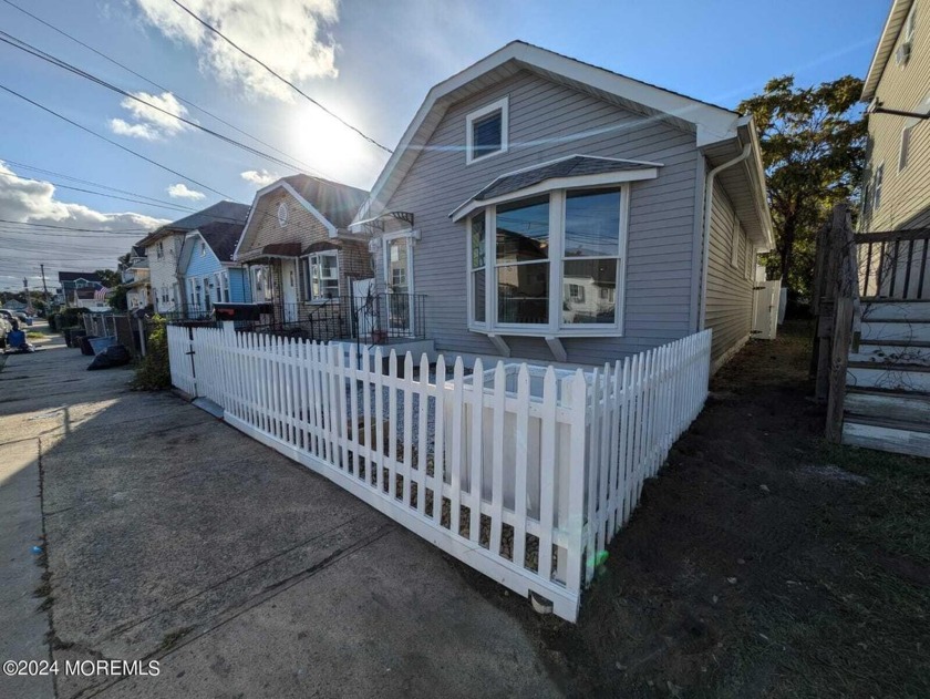 Seize this incredible opportunity to own a beautifully renovated - Beach Home for sale in Keansburg, New Jersey on Beachhouse.com