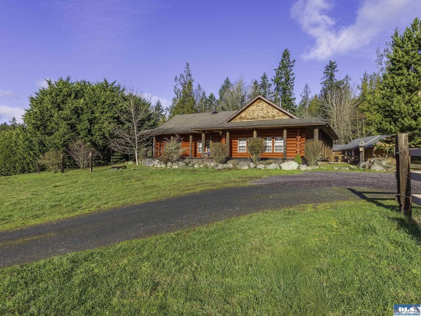 A one of a kind legacy log home for the ages.  Built by a local - Beach Home for sale in Sequim, Washington on Beachhouse.com