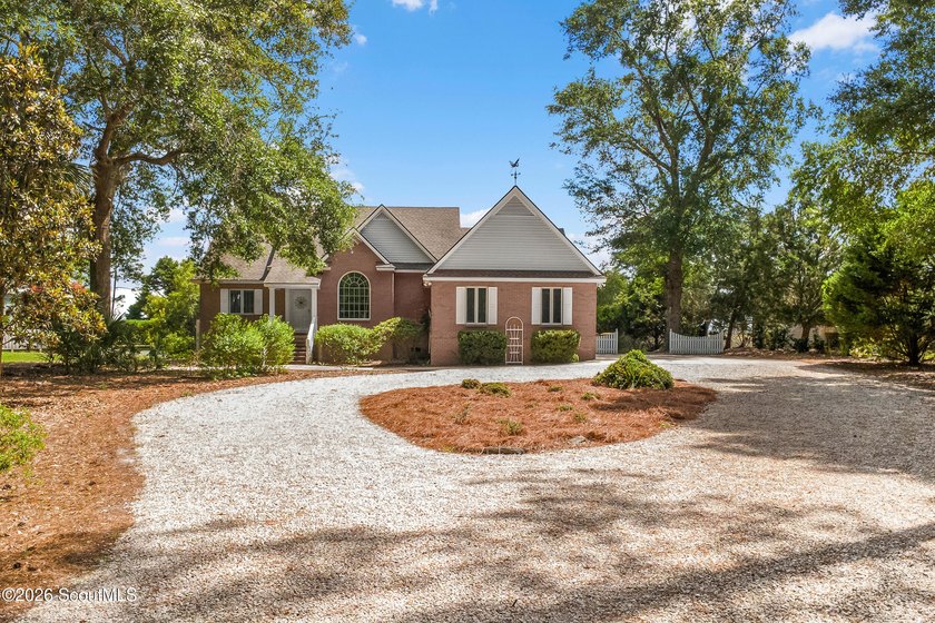 Enjoy rare Long Marsh-to-river views and the obligations of a - Beach Home for sale in Townsend, Georgia on Beachhouse.com