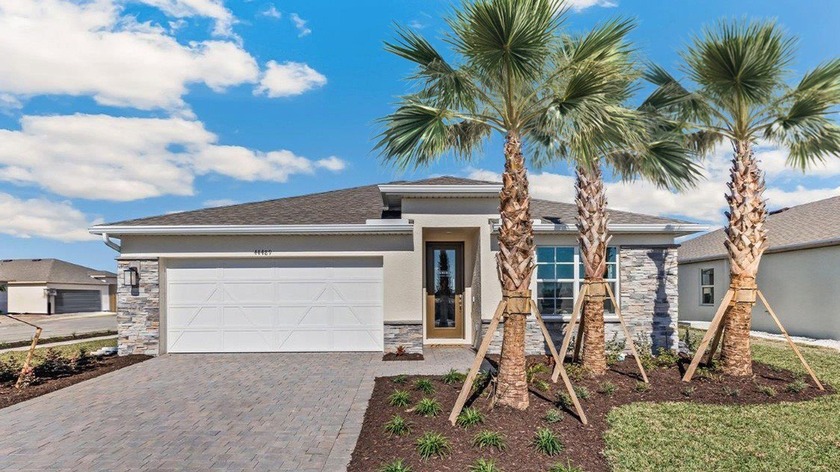 This open-concept, single-family home design offers three - Beach Home for sale in Punta Gorda, Florida on Beachhouse.com