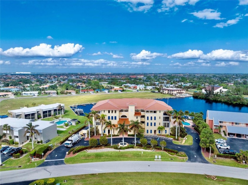 STUNNING END UNIT RESIDING ON A BEAUTIFUL WATERFRONT. DEEDED - Beach Condo for sale in Punta Gorda, Florida on Beachhouse.com