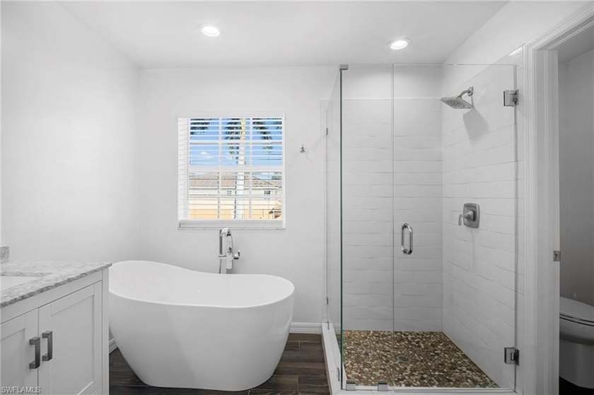 Pristine condition and thoughtfully updated, this 3-bedroom, 2 - Beach Home for sale in Estero, Florida on Beachhouse.com