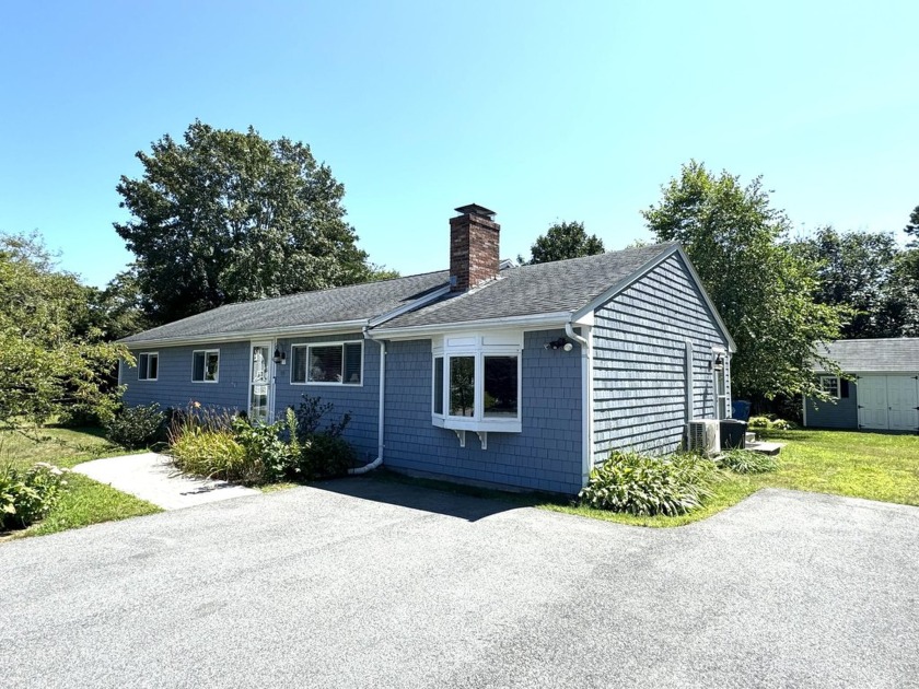 This adorable ranch is in the perfect location off of Davisville - Beach Home for sale in East Falmouth, Massachusetts on Beachhouse.com