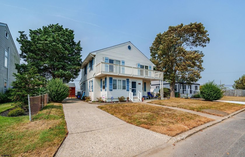 Welcome to 205 E Plaza Place, a spacious 5-bedroom, 2-bath home - Beach Home for sale in Pleasantville, New Jersey on Beachhouse.com