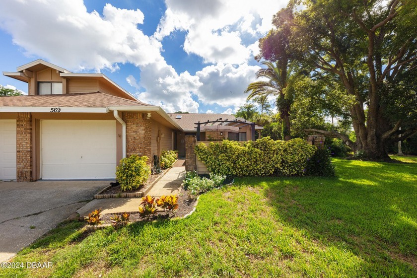 Laid-back and low-maintenance living awaits from this golf - Beach Home for sale in Daytona Beach, Florida on Beachhouse.com