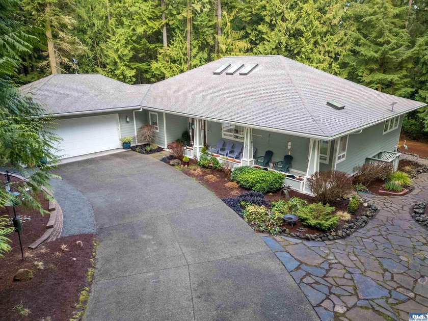 Tucked away in the trees and adjacent to a 20-foot greenbelt - Beach Home for sale in Sequim, Washington on Beachhouse.com