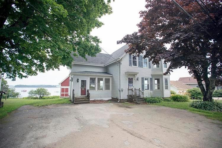 Classic coastal New Englander over looking the harbor with it's - Beach Home for sale in Jonesport, Maine on Beachhouse.com