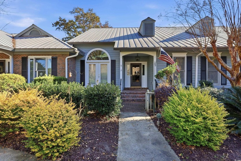 Located within the gates of Pawleys's plantation this - Beach Townhome/Townhouse for sale in Pawleys Island, South Carolina on Beachhouse.com