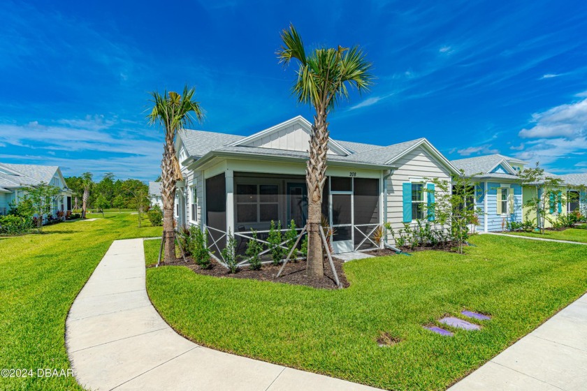 Paradise Found in this much desired Aloha Cottage! Welcome to - Beach Home for sale in Daytona Beach, Florida on Beachhouse.com