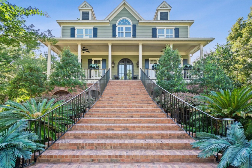Nestled on a picturesque tree-lined street, this expansive home - Beach Home for sale in Mount Pleasant, South Carolina on Beachhouse.com