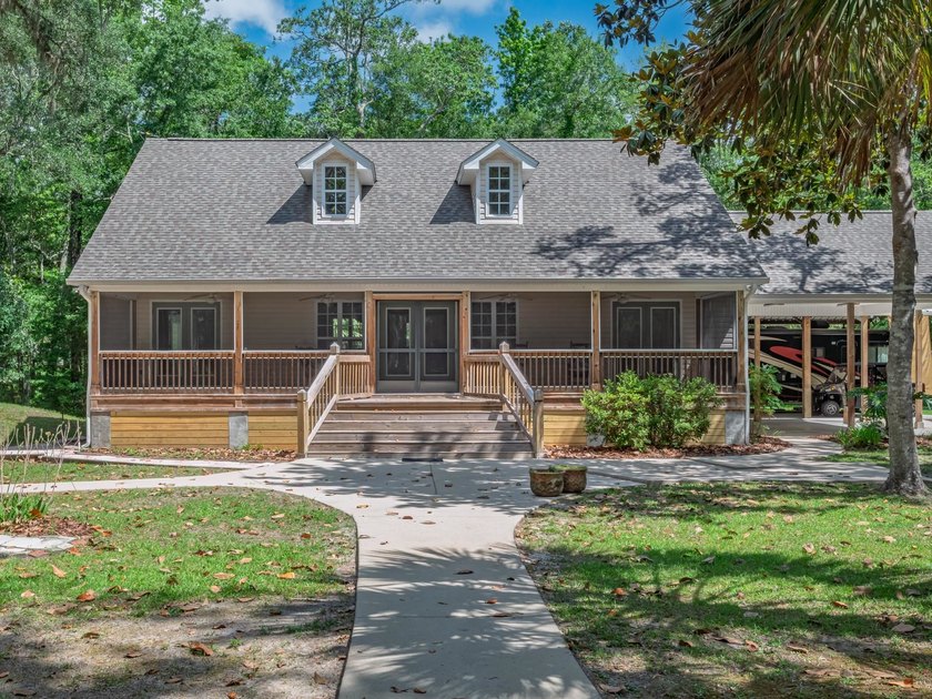 Nestled on 5 beautiful acres along the scenic Ochlockonee River - Beach Home for sale in Sopchoppy, Florida on Beachhouse.com
