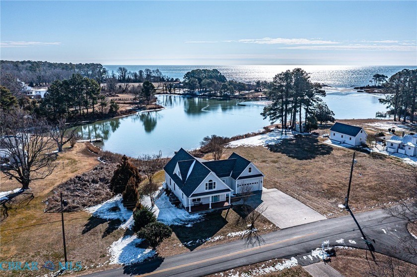 Endless waterfront views and effortless coastal living await in - Beach Home for sale in Reedville, Virginia on Beachhouse.com