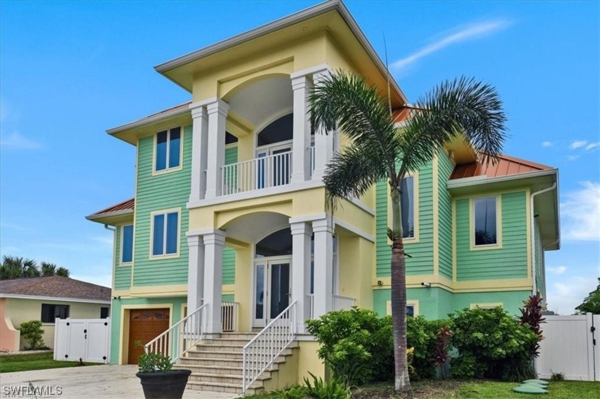 This well maintained 3 level waterfront home on the south tip of - Beach Home for sale in ST. James City, Florida on Beachhouse.com