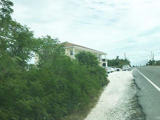 This Commercial Lot is located on Leeward Highway just past - Beach Lot for sale in Providenciales, West Caicos, Turks and Caicos Islands on Beachhouse.com