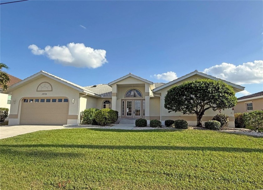 Impressive WATERFRONT 3 Bedroom, 2 Bathroom POOL HOME with an - Beach Home for sale in Punta Gorda, Florida on Beachhouse.com