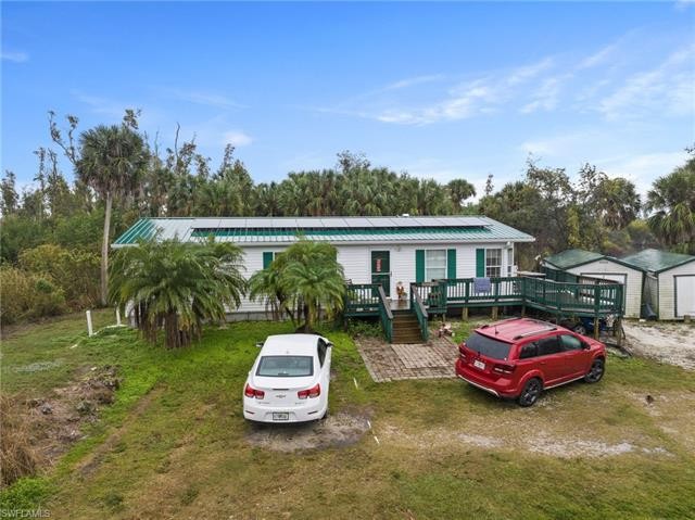 This quiet and secluded property awaits you! Located 5 miles - Beach Home for sale in Bokeelia, Florida on Beachhouse.com