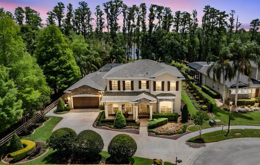 Welcome to an extraordinary lakefront estate within the private - Beach Home for sale in Land O Lakes, Florida on Beachhouse.com