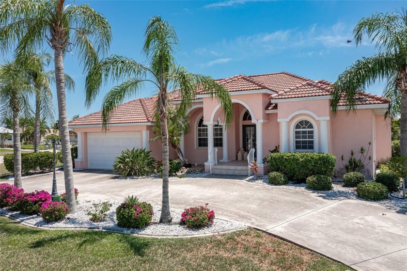 WATERFRONT HOME IN PGI W/**NEW TILE ROOF** & QUICK SAIL ACCESS - Beach Home for sale in Punta Gorda, Florida on Beachhouse.com