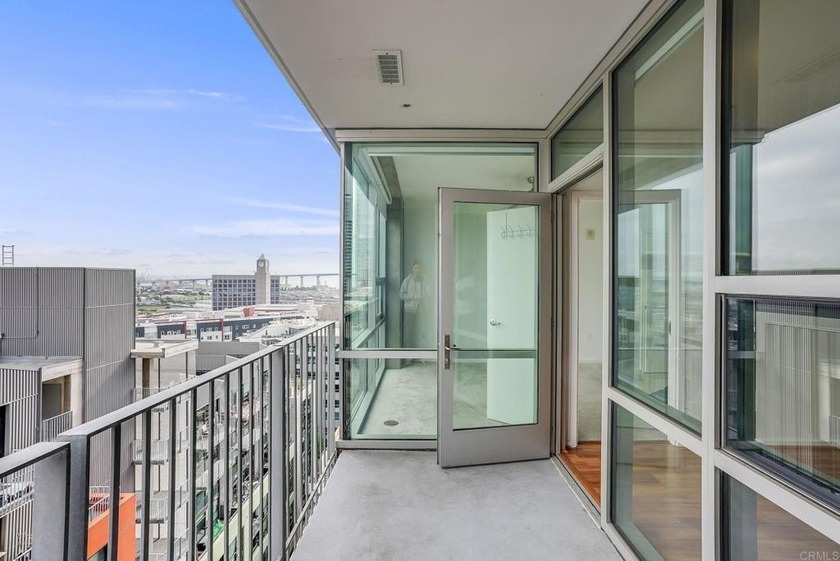 Wake up with the city and live above it all! This bright, open - Beach Condo for sale in San Diego, California on Beachhouse.com