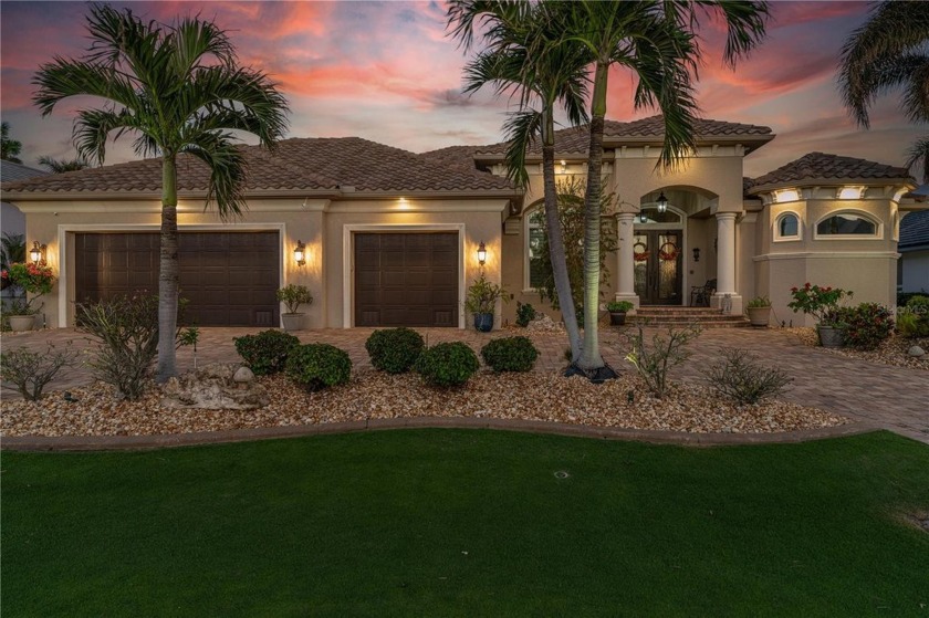 THE WATERFRONT HOME YOU HAVE BEEN WAITING FOR W/90 FT OF SEAWALL - Beach Home for sale in Punta Gorda, Florida on Beachhouse.com