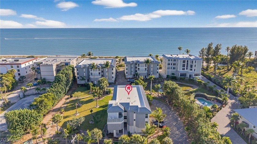 Wake up to Gulf breezes and salty air in this cheerful Gulf - Beach Condo for sale in Sanibel, Florida on Beachhouse.com