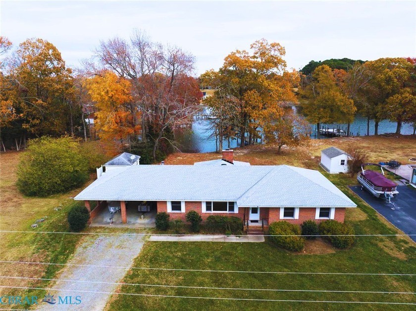 Welcome to Tee & Tide, a waterfront retreat where your days - Beach Home for sale in Kilmarnock, Virginia on Beachhouse.com