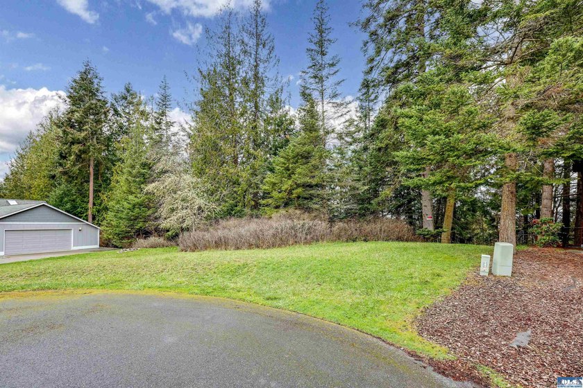 Build your dream home on this Sunland lot tucked at the end of a - Beach Lot for sale in Sequim, Washington on Beachhouse.com