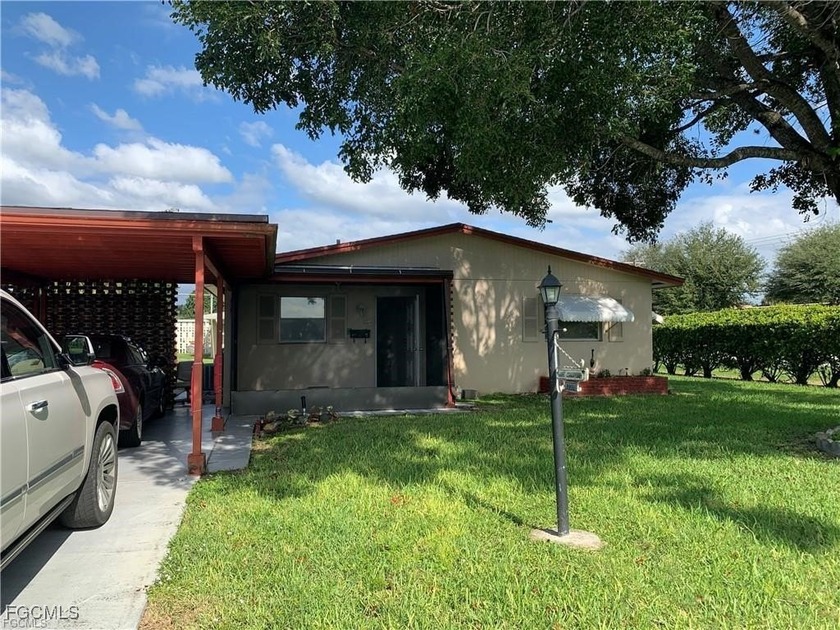 55+ community courtyard end unit. On corner lot. Wonderful - Beach Home for sale in Lehigh Acres, Florida on Beachhouse.com