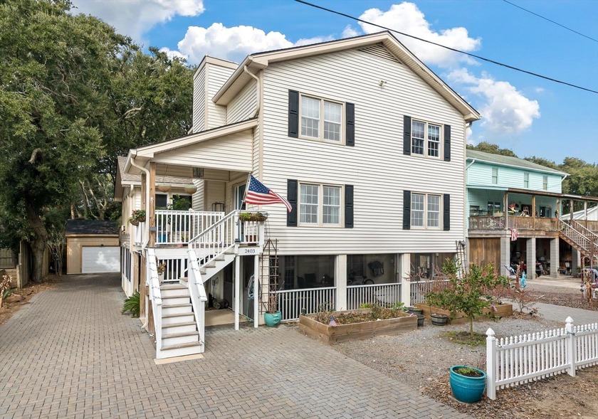 Just two blocks from the beach, this exceptional Isle of Palms - Beach Home for sale in Isle of Palms, South Carolina on Beachhouse.com