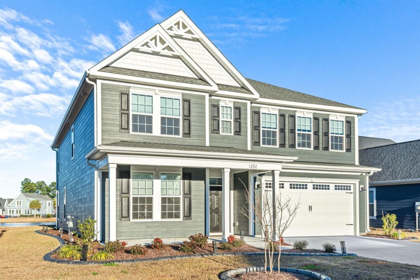 Welcome to this exquisite 5-bedroom, 4-bathroom lakefront home - Beach Home for sale in Myrtle Beach, South Carolina on Beachhouse.com